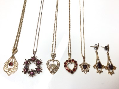 Lot 42 - Five 9ct gold gem set pendants on chains and a pair of 9ct gold and garnet pendant earrings.