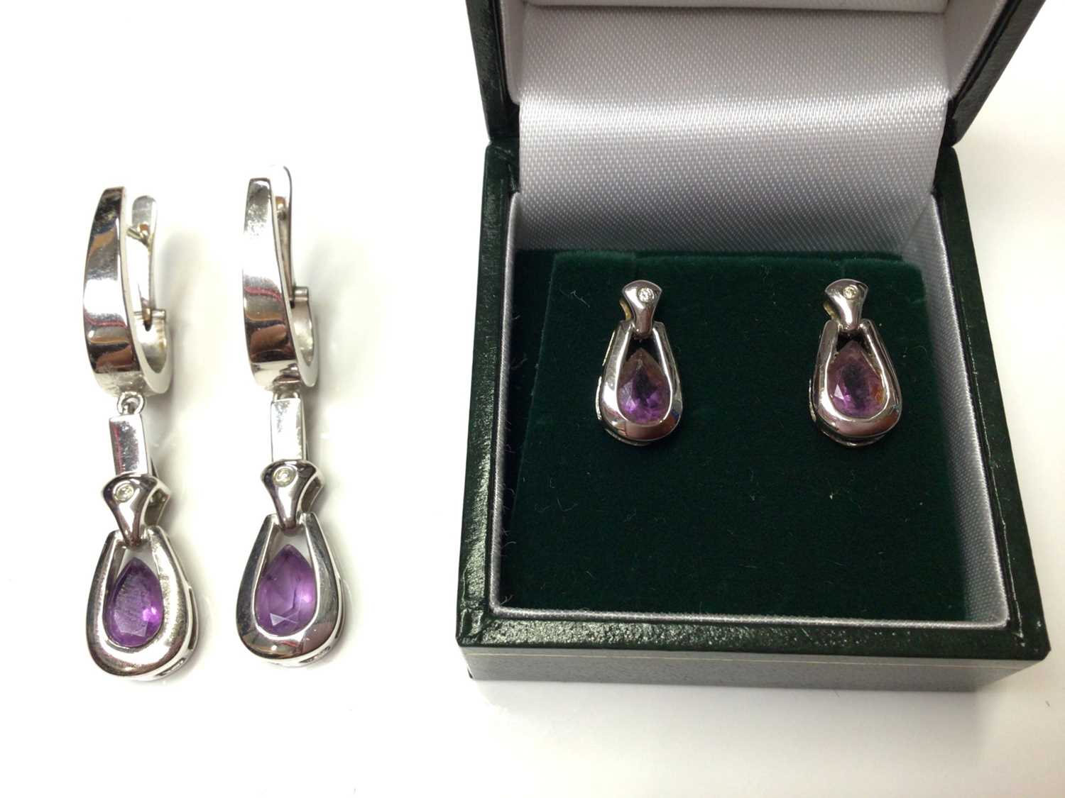 Lot 44 - Two pairs of 9ct white gold amethyst and diamond earrings