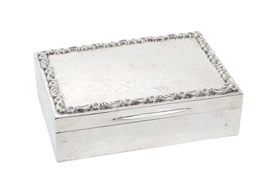 Lot 359 - George V silver box of rectangular form in the Arts & Crafts style with planished decoration and hinged cover with floral and scroll border and gilded interior (London 1914) Maker Mappin & Webb. Al...