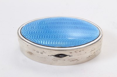 Lot 365 - George V silver pill box of oval form with blue guilloché enamel decoration to hinged cover (Birmingham 1918) Maker S Blanckensee & Son Ltd. All at approximately 1oz. 6.5cm overall length.