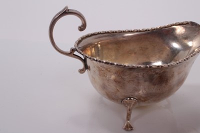 Lot 150 - George V silver sauce boat, (Birmingham 1924), maker A J Zimmerman, together with a continental silver dish, marked 835, all at 6ozs (2)
