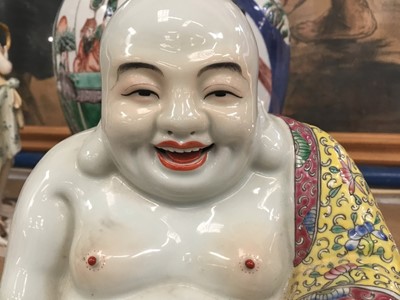Lot 132 - Chinese porcelain figure of Buddha