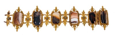 Lot 468 - Early 19th century banded agate and gilt metal bracelet