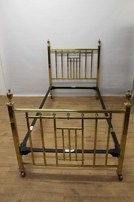 Lot 1452 - Pair of good quality Edwardian gilt brass single bedsteads, each with urn finials and lattice head and footboard tied by iron frames, internal measurements approximately 202 x 100cm