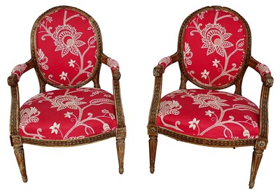 Lot 1385 - Rare pair of Louis XVI carved beech open armchairs