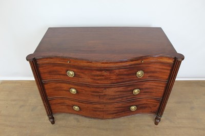Lot 1389 - George III mahogany serpentine chest of drawers