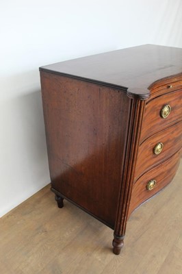 Lot 1389 - George III mahogany serpentine chest of drawers