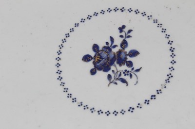 Lot 155 - Pair of Chinese porcelain platters, circa 1800, with geometric patterns and a central floral spray, 40.5cm wide