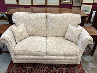 Lot 1399 - Pair of good quality traditional sofas, cream upholstered and raised on square tapered legs and castors, approximately 170cm wide