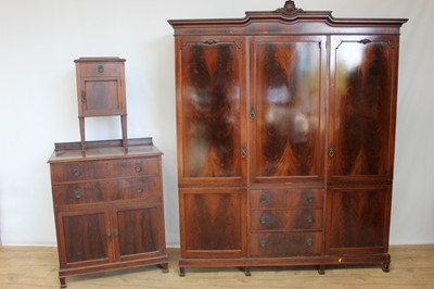 Lot 100 - Good quality Edwardian mahogany triple wardrobe, bedroom chest and bedside cabinet.