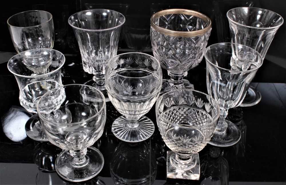 Lot 211 - Good group of nine 19th century glass goblets, of various shapes, with cut and engraved decoration, the largest measuring 17cm high