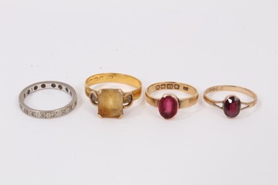 Lot 518 - 18ct gold ring with red stone intaglio, 18ct gold eternity ring, a 22ct gold ring with citrine and a 9ct garnet ring