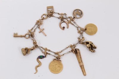 Lot 520 - Gold charm bracelet