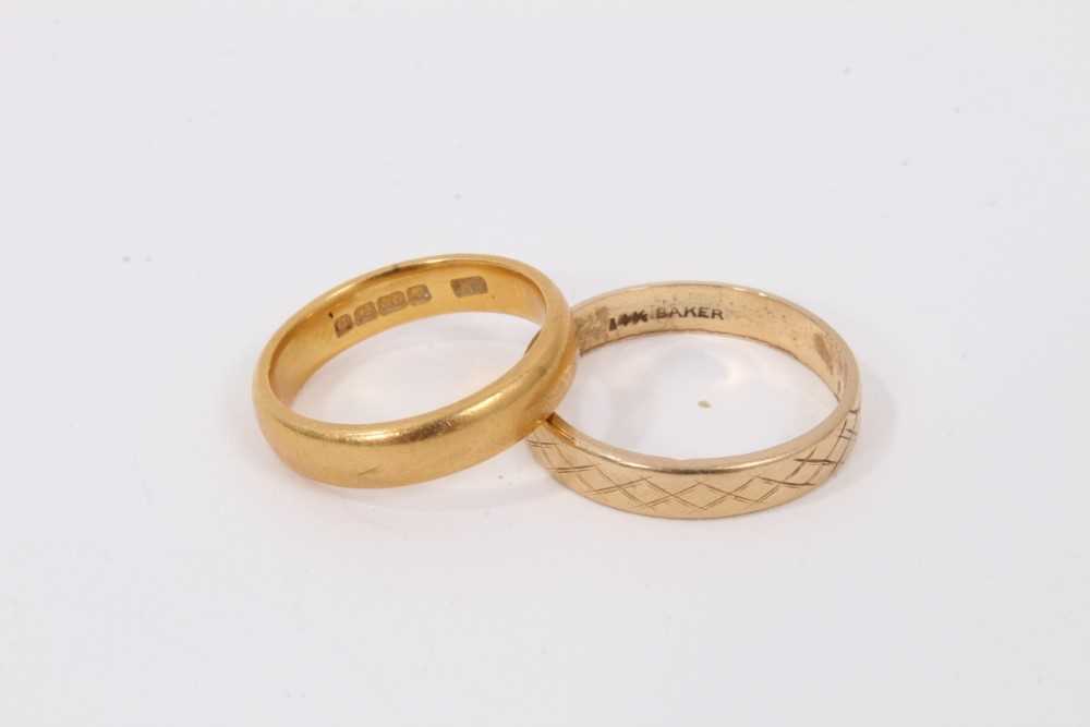 Lot 522 - 22ct gold wedding ring and a 14k wedding ring