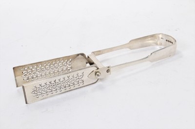 Lot 411 - Pair of Victorian silver fiddle pattern asparagus tongs with pierced and reeded decoration, (London 1837), makers mark rubbed, all at 4ozs, 24cm in length