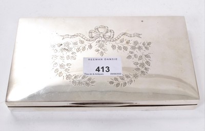 Lot 413 - George V silver cigarette box of rectangular form with engraved decoration to hinged cover and cedar lined interior, (London 1915), makers mark rubbed, 18 x 10cm