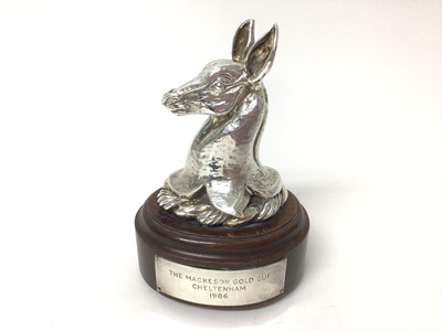 Lot 961 - Contemporary silver Horse Racing trophy in the form of a Deers head, (London 1986) maker, Garrard & Co Ltd, mounted on oval mahogany base with applied plaque 'The Mackeson Gold Cup Cheltenham 1986'