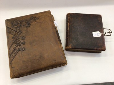 Lot 1496 - Two Victorian leather bound photographs albums containing cabinet cards, carte de visites and photographs