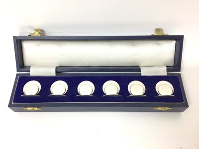 Lot 426 - Set of six contemporary silver menu holders of circular form, (London 1987 / 1988), makers JAC, in a fitted case, all at 3ozs.