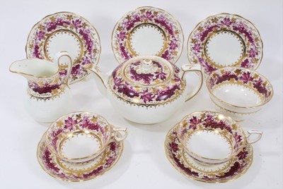 Lot 229 - Good quality English porcelain tea service, painted in purple and gilt with a grapevine pattern, retailed by T. Goode & Co, comprising a teapot, milk jug, sugar bowl, eleven cups, ten saucers and s...