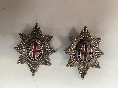 Lot 708 - Pair of early 20th century Coldstream guards white metal and enamel collar badges / brooches