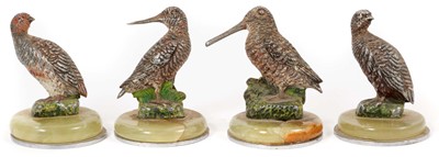 Lot 957 - Four Austrian cold painted place name/menu holders in the form of Woodock, Snipe and Grouse, on circular onyx and chromium plated bases, 4cm high