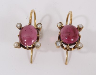 Lot 527 - Pair of antique cabochon garnet and seed pearl earrings with an oval cabochon and four seed pearls in gold setting, 19mm.