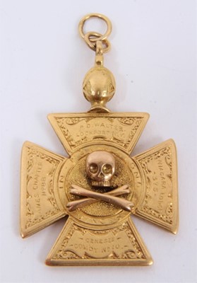 Lot 528 - Victorian gold Masonic pendant, the Maltese cross with skull and crossed bones and engraved Masonic emblems, approximately 40mm x 25mm.