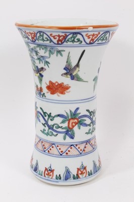 Lot 943 - Chinese Gu vase, decorated in the Wucai style with bands of birds and flowers, six-character Wanli mark around rim, 24cm high