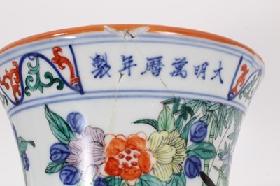Lot 943 - Chinese Gu vase, decorated in the Wucai style with bands of birds and flowers, six-character Wanli mark around rim, 24cm high
