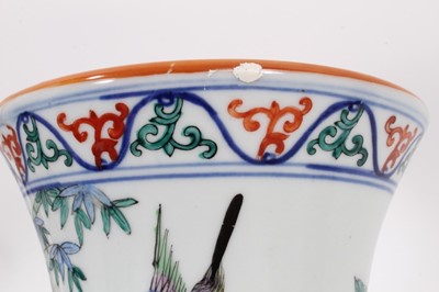 Lot 943 - Chinese Gu vase, decorated in the Wucai style with bands of birds and flowers, six-character Wanli mark around rim, 24cm high