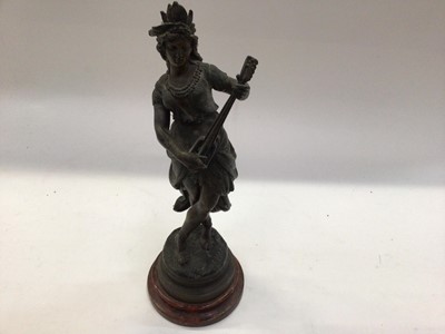 Lot 2499 - Early 20th century spelter figure of a football player, titled 'La Science', on turned plinth, togeathet with a spelter figure after Augusta Moreau of a female musician. (2)