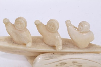 Lot 985 - Fine 1930s Eskimo walrus ivory carving of three rowers in a canoe, 12.5cm