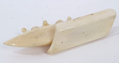 Lot 985 - Fine 1930s Eskimo walrus ivory carving of three rowers in a canoe, 12.5cm