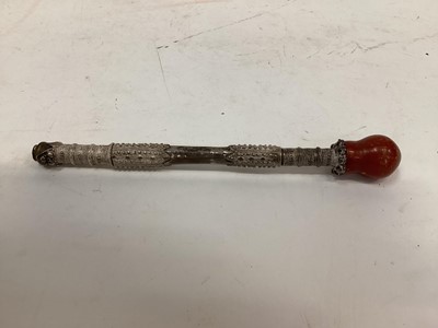 Lot 2400 - Tibetan white metal pipe with amber mouthpiece