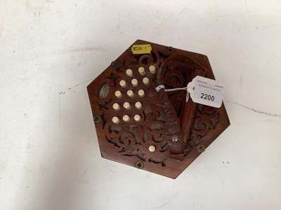 Lot 2200 - Victorian concertina by Butler of Haymarket, London, with fretwork ends and ivory buttons