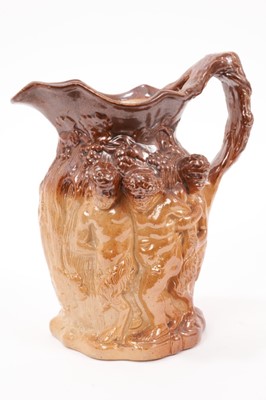 Lot 30 - Early 19th century salt glazed Bacchanalian jug