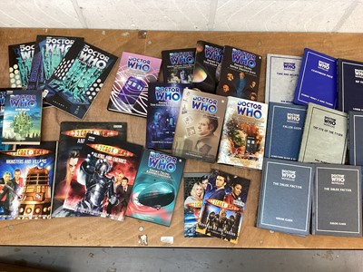 Lot 1729 - Four boxes of Dr Who books, DVDs and other related items