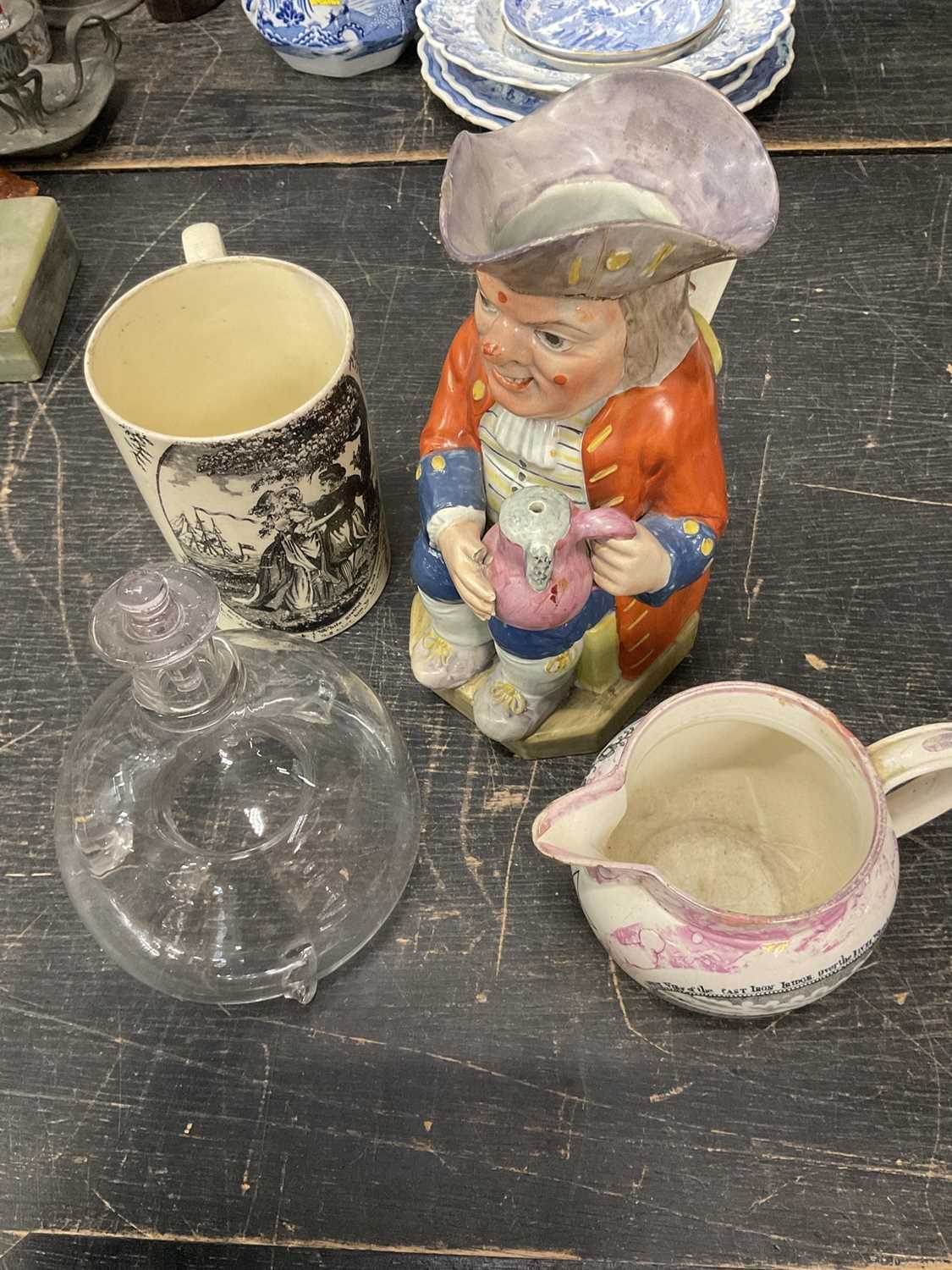 Lot 146 - Early 19th century pearl ware Toby jug, together with a Leeds type creamware tankard, a 19th century blown glass wasp catcher and a Sunderland lustre jug