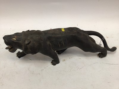 Lot 2552 - Eastern ebony carving of a lion