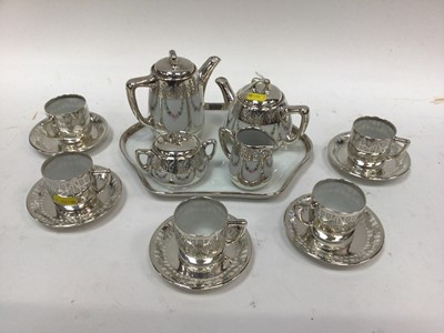 Lot 1086 - White metal mounted German tea and coffee set