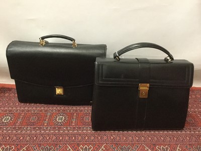 Lot 2078 - Ladies black leather briefcase with red lining, Samsonite black leather brief case, three good quality leather handbags and some ladies driving gloves, unused.