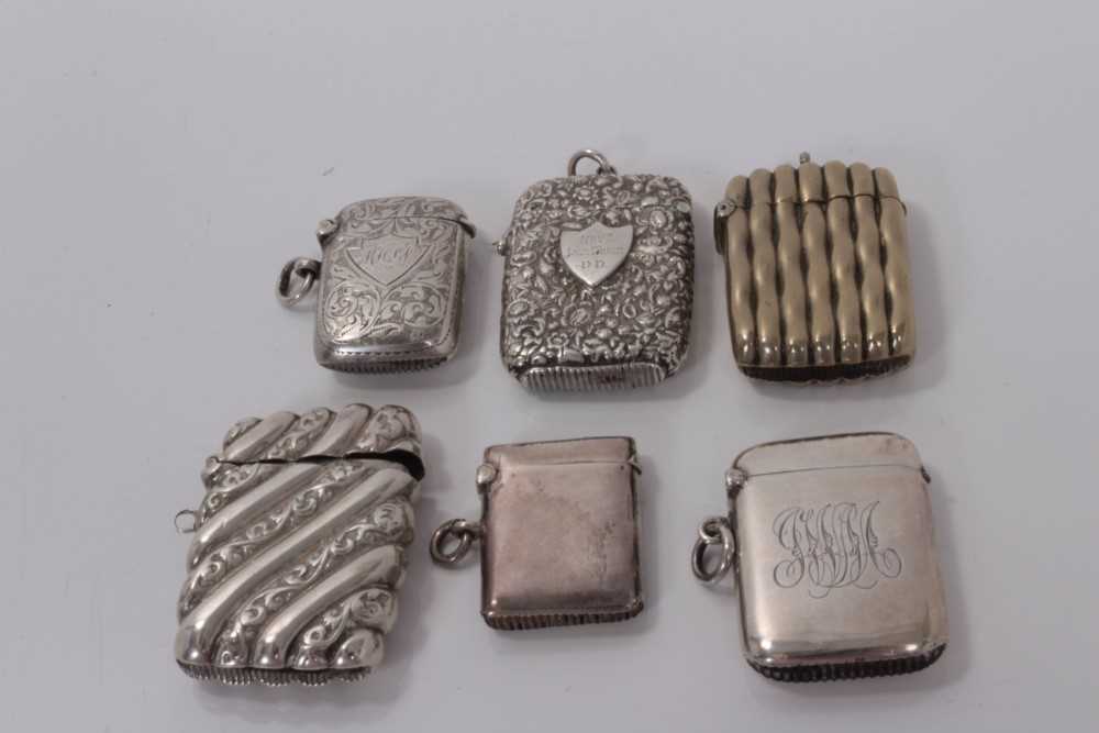 Lot 33 - Victorian silver vesta case, (Birmingham 1893), maker George Unite, together with four other Victorian and later silver vesta cases and one silver plated vesta case, (various dates and makers), all...