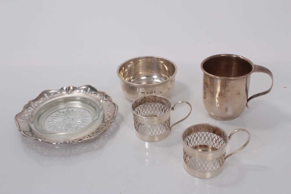 Lot 37 - Edwardian silver sugar bowl (Birmingham 1901), George V silver christening mug (Birmingham 1924), silver and glass butter dish and two silver coffee can holders (various dates and makers), all at 7...