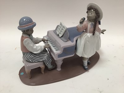 Lot 1057 - Lladro porcelain figure group - pianist and singer, boxed