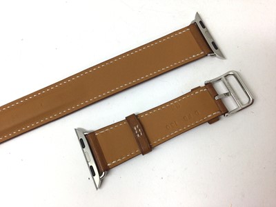 Lot 2086 - Hermes tan leather Apple 'Double Tour' watch strap in original Hermes box, soft pouch and paperwork.