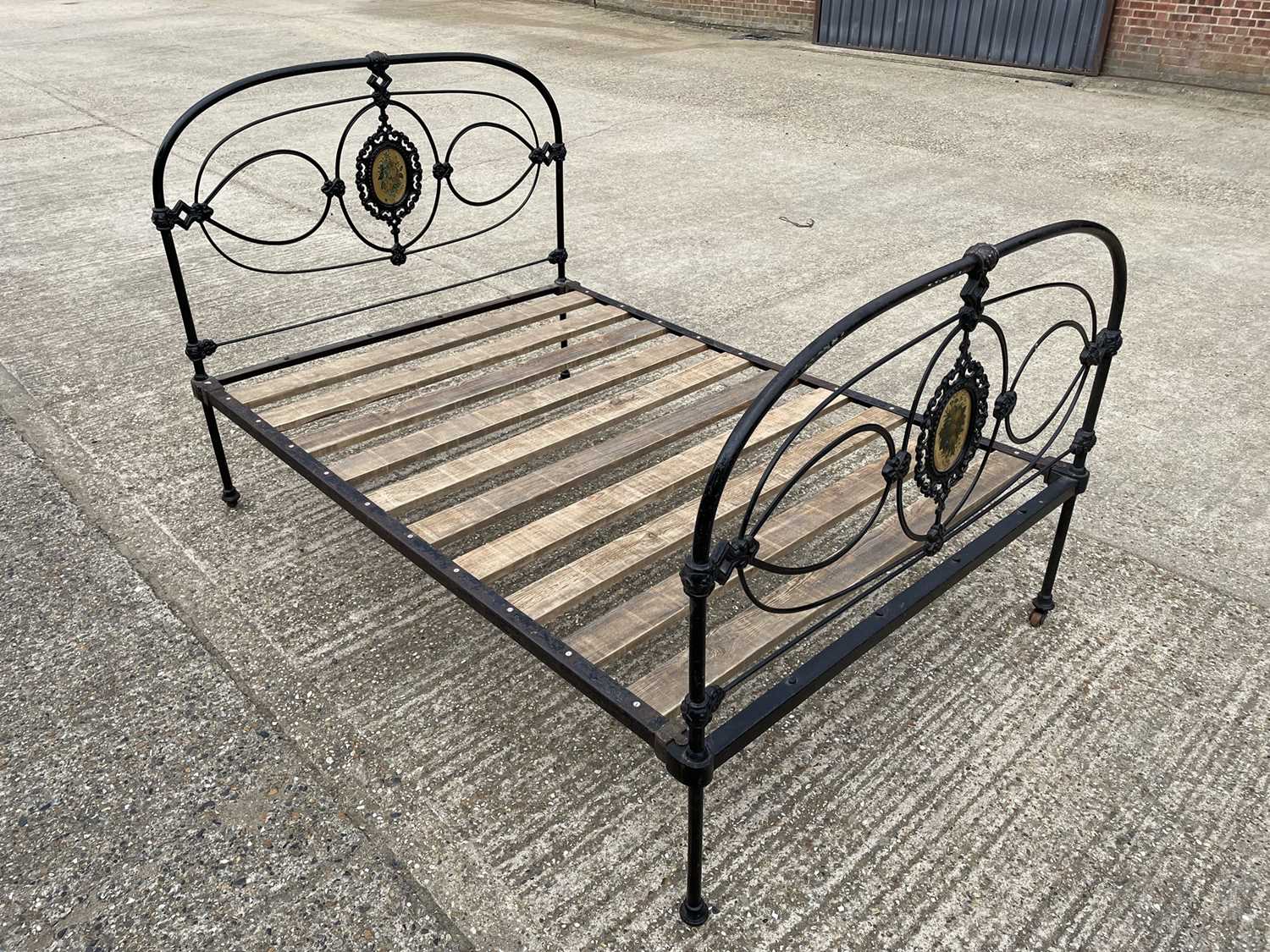 Lot 53 - Iron framed double bed
