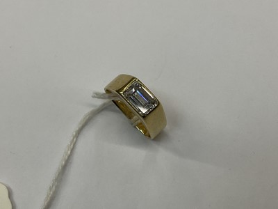 Lot 441 - Diamond single stone ring with a rectangular emerald cut diamond in 18ct yellow gold setting