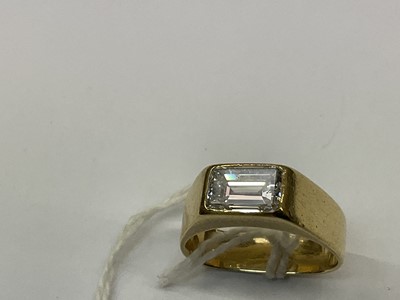 Lot 441 - Diamond single stone ring with a rectangular emerald cut diamond in 18ct yellow gold setting