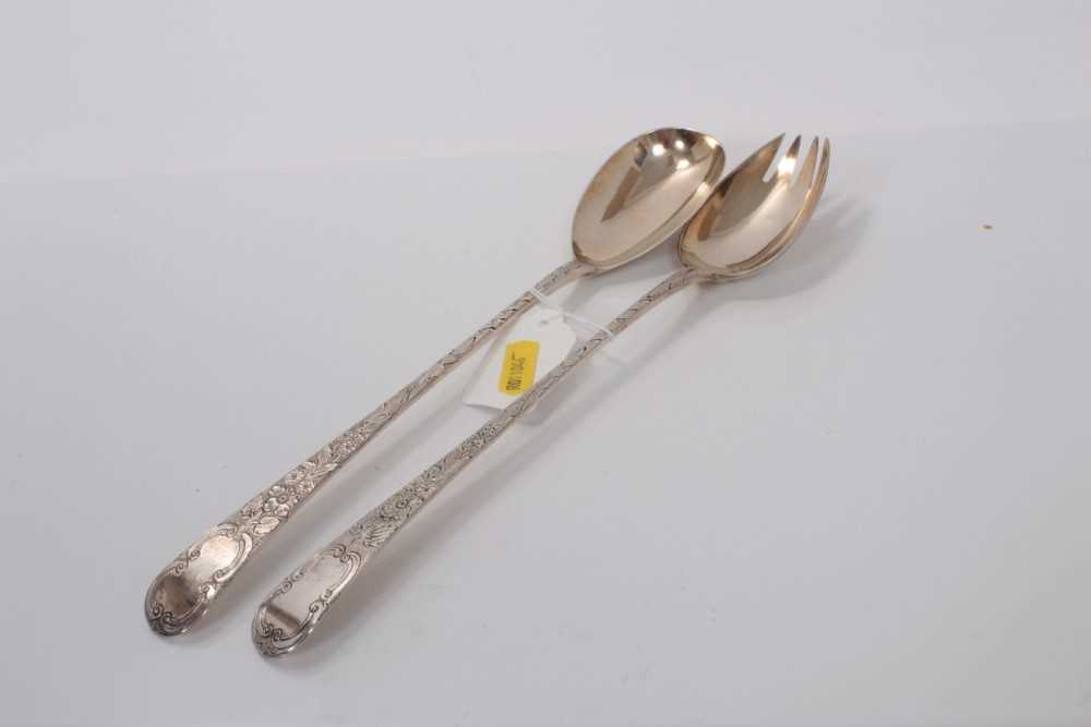 Lot 50 - Pair of George III Old English pattern basting spoons, later converted into salad servers, (London 1786), maker W S, 30cm in length, all at 5.5ozs